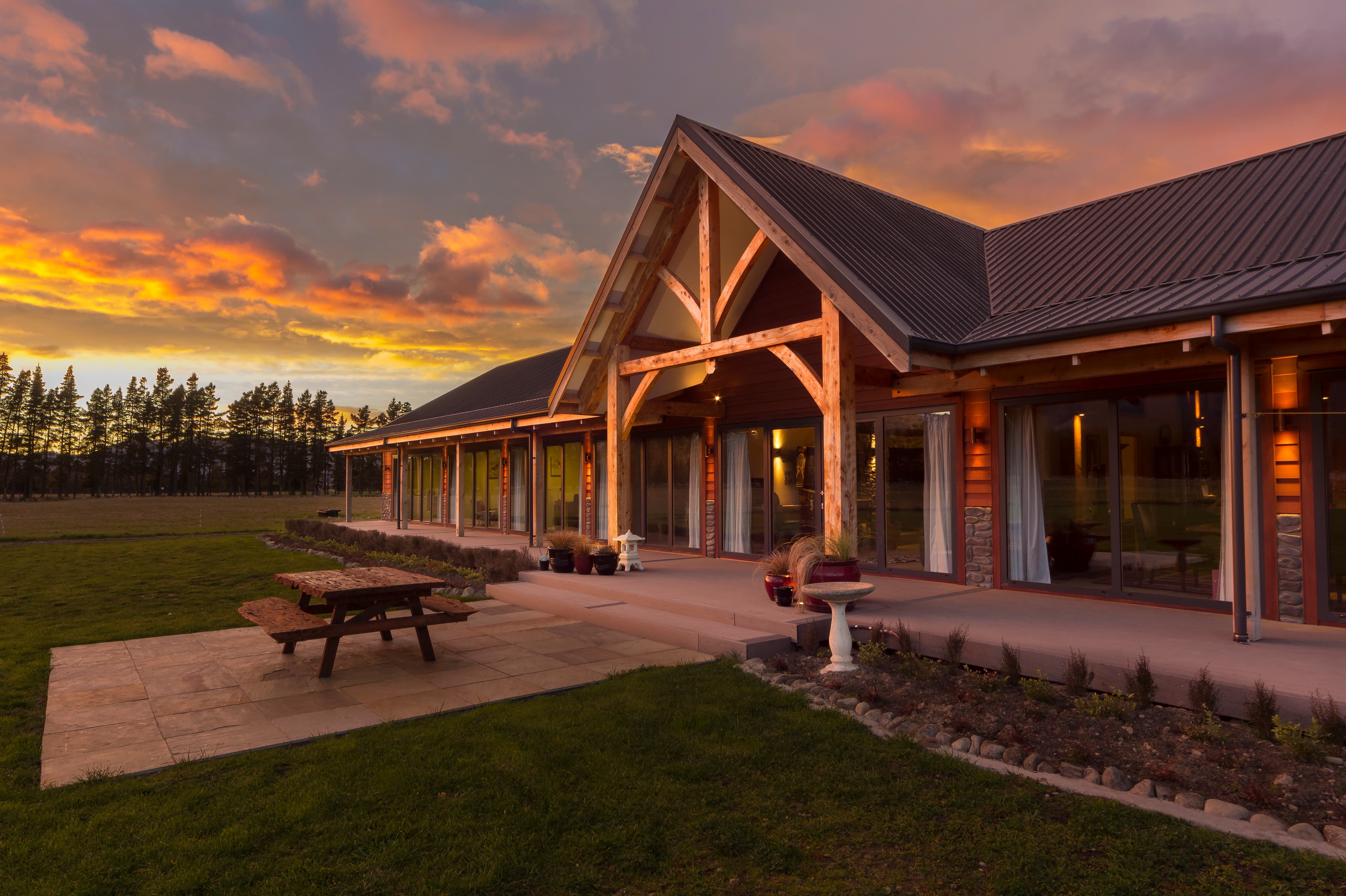 Mortise and tenon timber frame barn home construction for a luxury alpine lodge in Hanmer, NZ, by Heritage Timbercraft